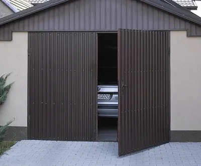 Виды гаражных ворот для строительства частного дома