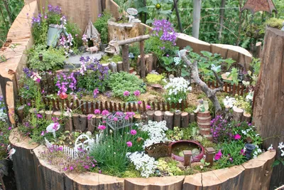 Украшение для сада: декор приусадебного участка и огорода цветами, фото