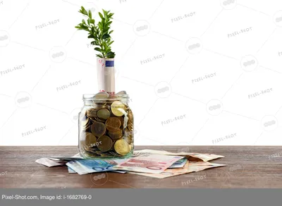 Банкнота в стеклянной банке и мешок с деньгами стоковое фото ©ChamilleWhite  11249605
