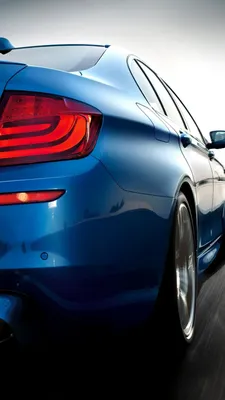 Фотография BMW Alpina 5-Series Sedan F10 Седан синие едущий Сбоку