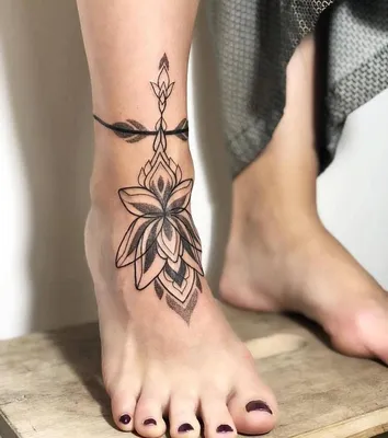 Женские тату на ноге - фото, эскизы и особенности татуировки на ноге для  девушек