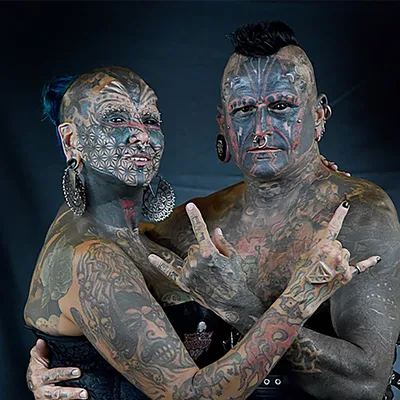 Самые странные рекорды: татуировки по всему телу и волосы Рапунцель | РБК  Life
