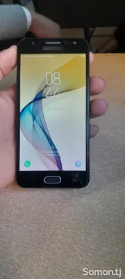 черный смартфон Samsung на коричневой деревянной поверхности · Бесплатные  стоковые фото