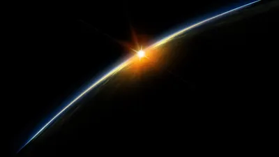 Большие куски камней вокруг синей планеты - обои на рабочий стол