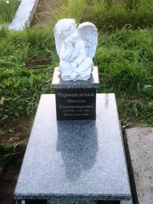Черный памятник с ангелочком для мальчика фото