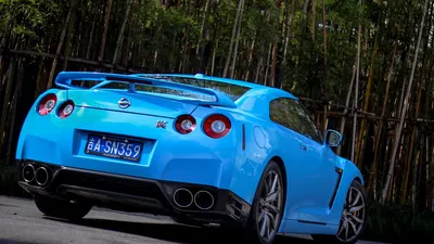 Картинка Ниссан GT-R R35 оранжевая авто 1366x768