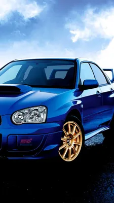 Обои на рабочий стол Японский легковой автомобиль Subaru Impreza / Субару  Импреза стоящий у каменной стены с граффити, обои для рабочего стола,  скачать обои, обои бесплатно