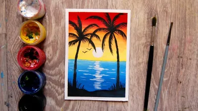 Пальмы на пляже на закате | Премиум Фото