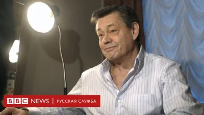 Фон с рисунком Николая Караченцова на iOS