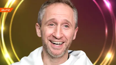 Фотография Оскара Кучеры, отражающая его харизматичность